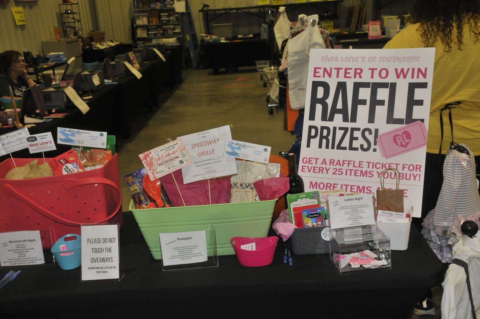 Raffle prize displays and ticket information at Rhea Lana's of Muskogee October 2026